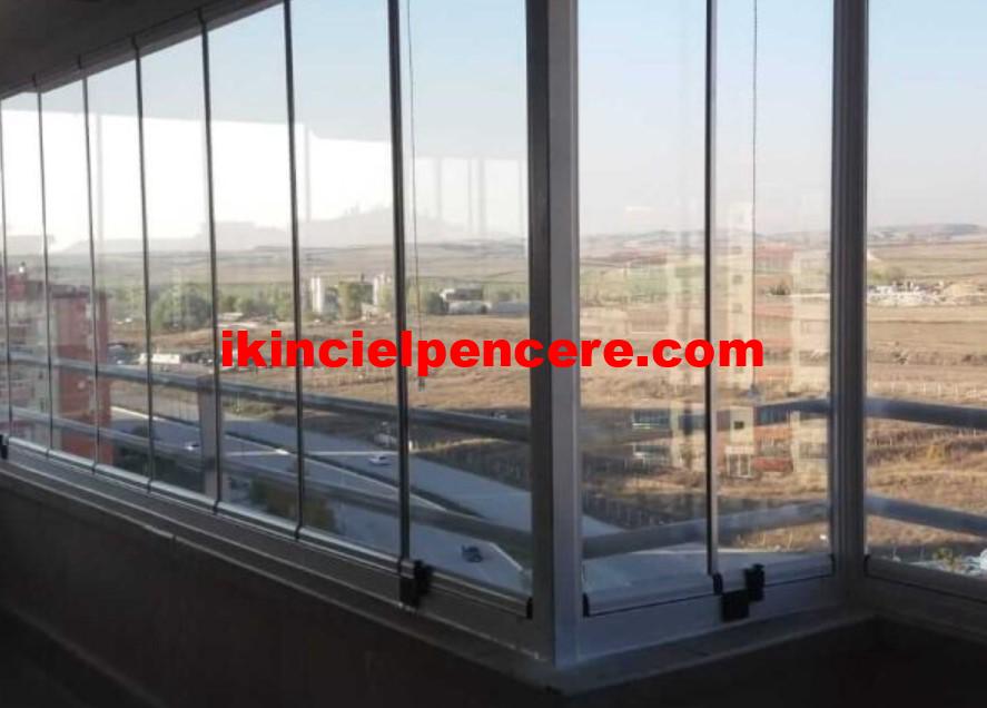 itina ile sökülmüş cam balkon pencere